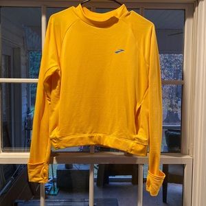 Brooks yellow/gold athletic top. NWOT